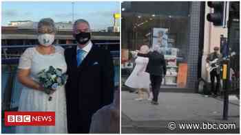 Wedding couple bring first dance bliss to Belfast's streets - BBC News