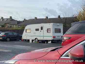 Travellers park caravans on Clitheroe supermarket car park
