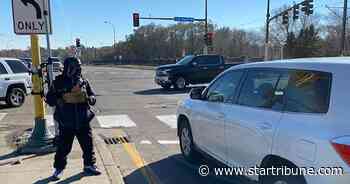 Is it legal to panhandle from a street median in Minneapolis?