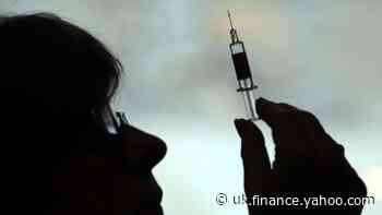 Vaccine optimism fades on muted day for markets