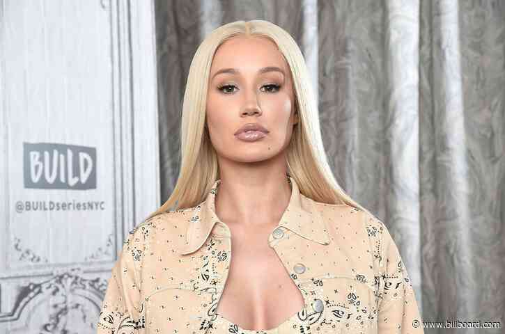 Iggy Azalea Is Feeling ‘Cute as F—‘ in Soft Cream Bodysuit