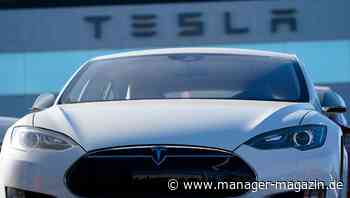 Dax stagniert trotz Dow-Rekordhoch, Tesla steigt in S&P 500 auf