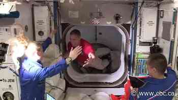 SpaceX capsule with 4 astronauts docks at International Space Station