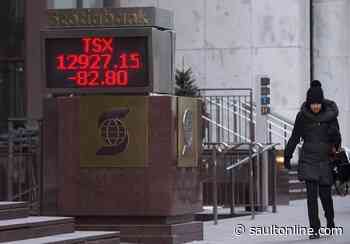 North American stock markets down in early trading, loonie edges lower