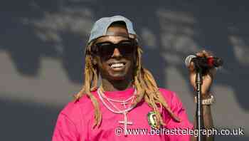 Rapper Lil Wayne charged with gun offence in Florida