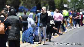 10-hour queues amid explosive outbreak
