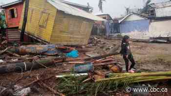 Iota weakens to storm, but death toll rises as rain, floods bash Central America