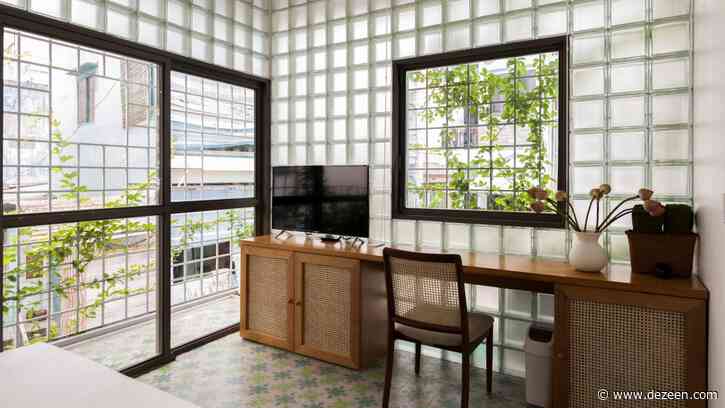 ROOM+ Design & Build replaces walls of house in Ho Chi Minh City with glass bricks