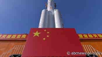 China positions rocket ahead of ambitious lunar mission