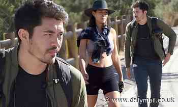 Henry Golding sports a ruggedly handsome look during a hike with pregnant wife Liv Lo in Los Angeles