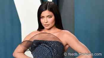Kylie Jenner wows in teeny-tiny bikini by the pool