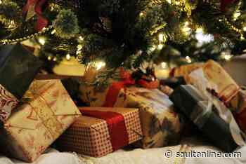 Com­­munity partners kick off the holiday season in Downtown Sault