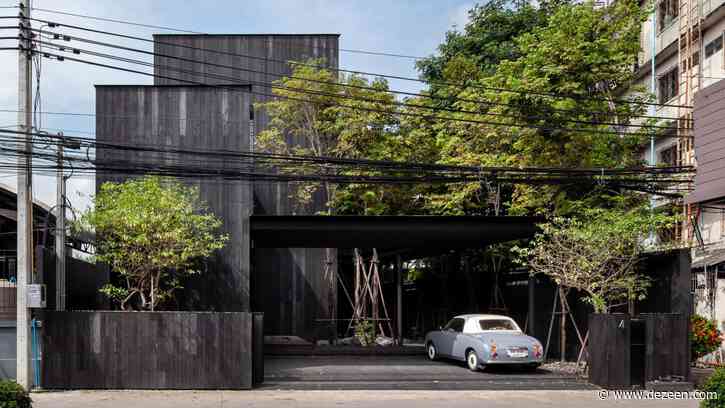 Charred wood and greenery conceal IDIN Architects' Office in Thailand