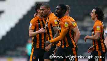 Watch: Josh Magennis bags early brace to blast Hull City into the lead at MK Dons