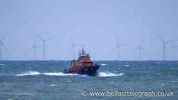 Rescue teams and fishing boats resume search for missing crew of sunken vessel