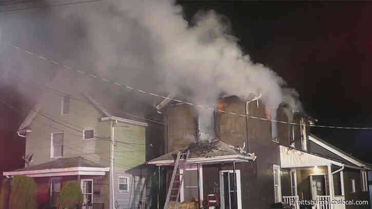 Firefighters Battle House Fire, Crews Help Elderly Woman To Safety