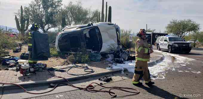 Single vehicle rollover leads to car catching fire