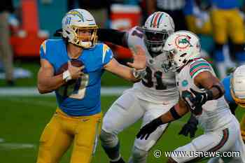 The Latest: Chargers QB Herbert 4th Fastest to 20 TD Passes