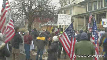 Protesters against new coronavirus restrictions gather outside Poloncarz's home