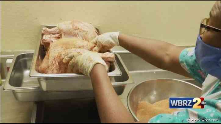 St. Vincent de Paul workers begin preparing for their Thanksgiving meal distribution