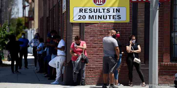 People are waiting on long lines for coronavirus tests ahead of the Thanksgiving holiday