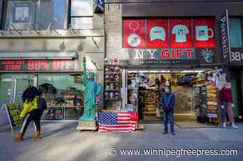 Tourists few, NY gift shops struggle but don't lose (heart)