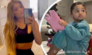 Kylie Jenner bares her trim waist in a sports bra before bragging about her 'big girl' Stormi