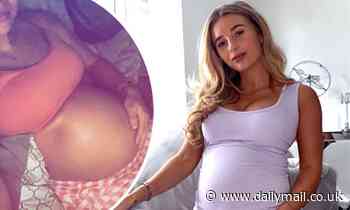 Pregnant Dani Dyer showcases her bare baby bump as she reaches the 30th week of her pregnancy 