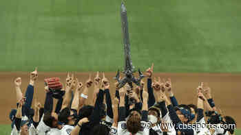 NC Dinos celebrate first Korean Series win with enormous sword trophy