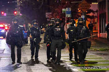 After a summer of protests, Seattle cuts police department budget by nearly 17%