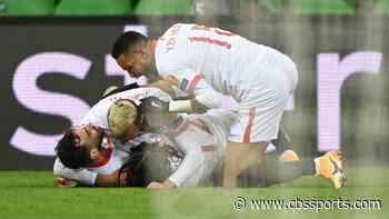 Chelsea, Sevilla win Champions League matches with injury-time goals