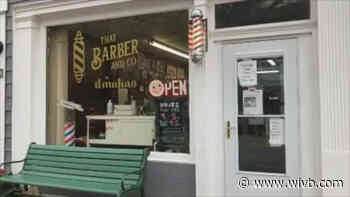 Barbershop owner finds himself in unique situation with locations in "yellow" and "orange" zones