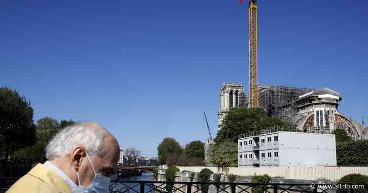 Restorers remove dangerous Notre Dame cathedral scaffolding
