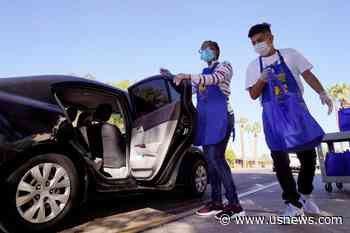 Phoenix College Alumni Members Donate Student Holiday Meals
