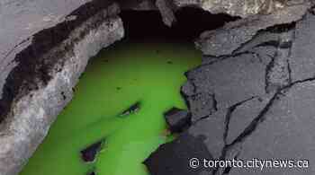 Why was a Toronto sinkhole gurgling neon green liquid? - CityNews Toronto