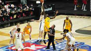 College basketball season tips off during coronavirus surge, with March Madness the ultimate goal