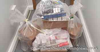 Thousands of illegal cigarettes and 'laughing gas' canisters seized in Bolton raids - Manchester Evening News