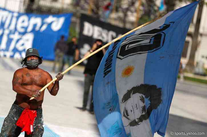 Argentines mourn flawed hero Maradona as family seeks quick burial