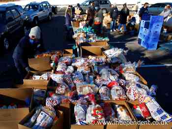 Feeding America at Thanksgiving: Miles-long lines at food banks and soup kitchens as 25m struggled with hunger this week