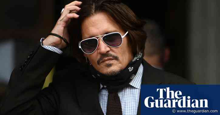 Dior sticks by Johnny Depp in defiance of 'wife beater' ruling