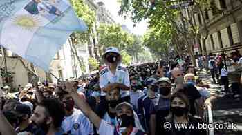 Diego Maradona: Fans weep by football legend's coffin
