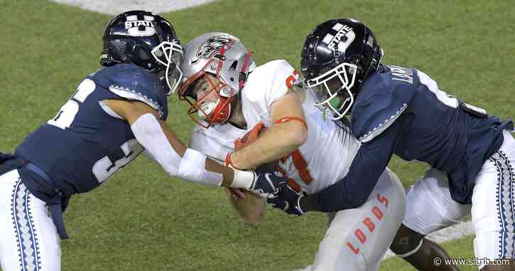 Utah State routs New Mexico 41-27 for its first football win of the season