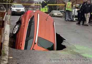 Sinkhole swallows car in New York City