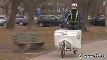 Parcel delivery companies are trading trucks for bikes in some Canadian cities. Here's why