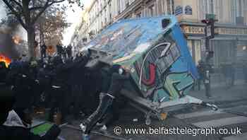 Teargas fired as French protesters condemn bill outlawing use of police images