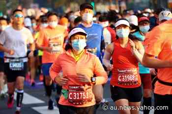 Shanghai marathon defies coronavirus with 9,000 runners - Yahoo News Australia