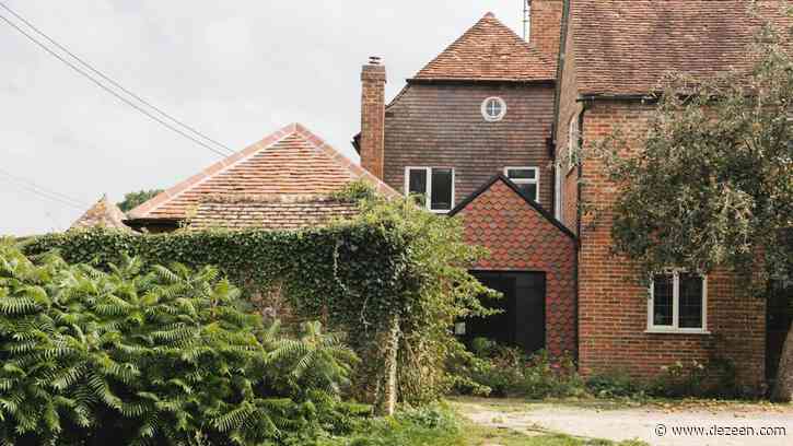 Terracotta tiles add warmth to Wiltshire farmhouse kitchen by Emil Eve Architects