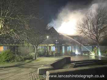 Fire  crews battle through night as huge blaze engulfs former restaurant