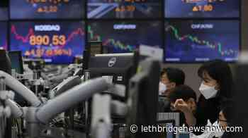 Global shares mixed after fresh records on Wall Street - Lethbridge News Now