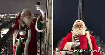 Santa Claus switches on Newcastle’s Christmas lights from top of Grey’s Monument
